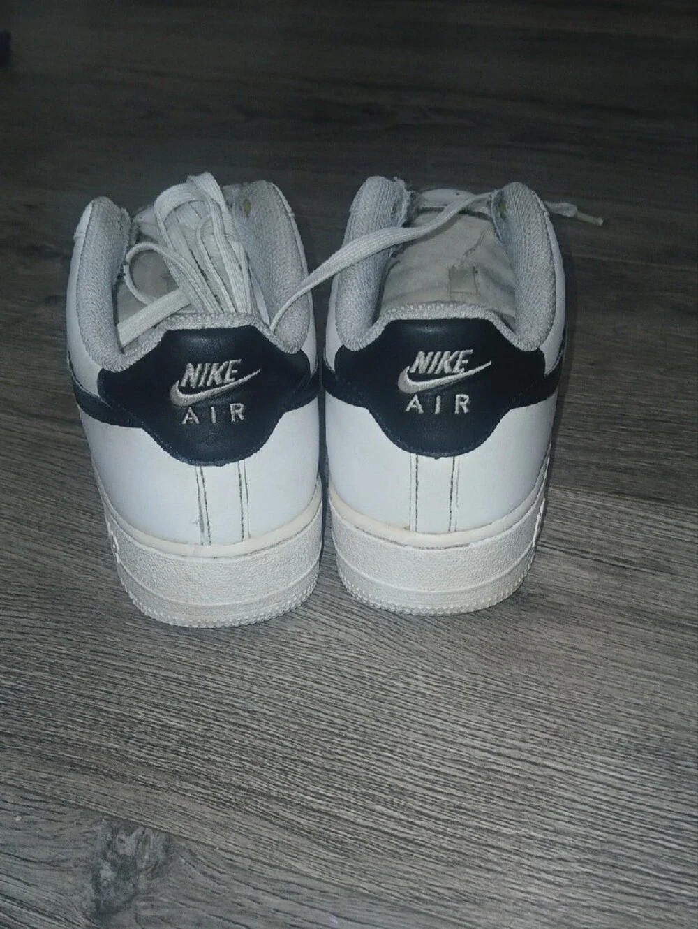 Nike Men’s White Sneakers with Black Swoosh